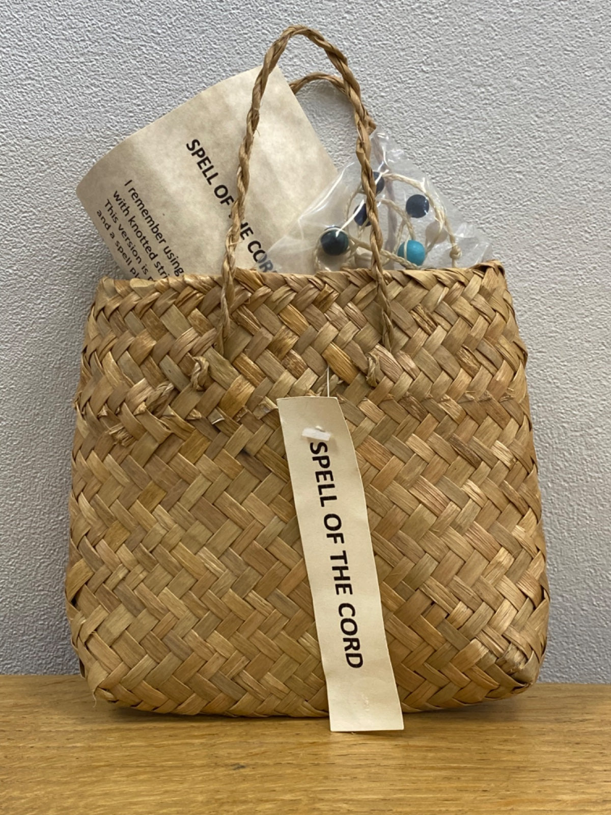 Spell of the Cord in flax bag