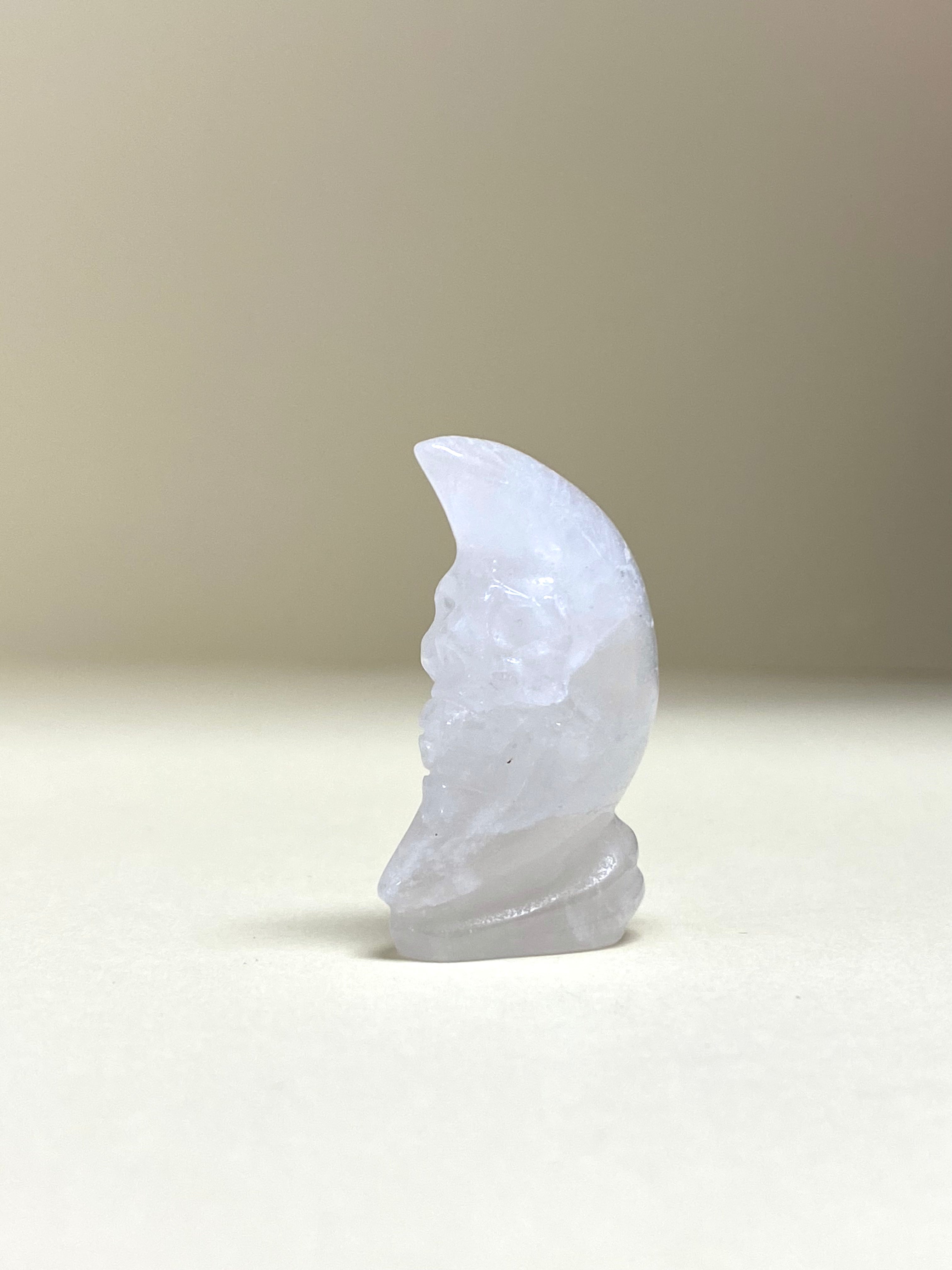 Clear Q Moon with face