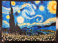 Large makeup bag featuring Van Gogh's Starry Night design with blue swirling sky, yellow stars and moon, black cypress tree, and white flower field at base