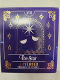 The Star tarot card lavender fragranced candle with purple box, gold foil design and celestial imagery