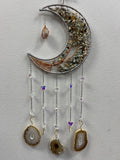 Grey crescent moon suncatcher with chip stones, agate slices, and purple crystal hanging charms