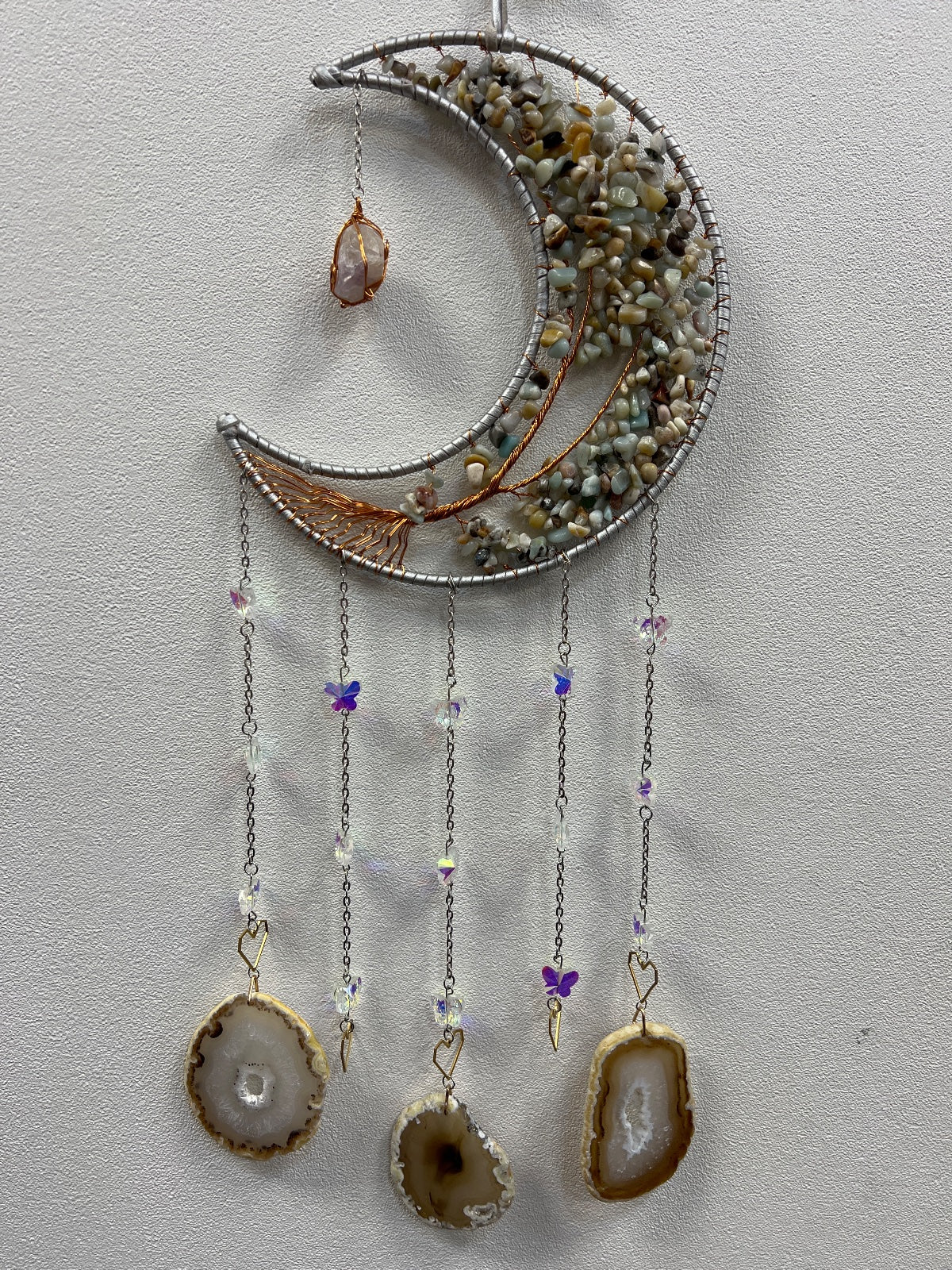 Grey crescent moon suncatcher with chip stones, agate slices, and purple crystal hanging charms