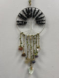 Onyx Crystal Tree of Life suncatcher with black beaded branches, wire frame, and colorful gemstone pendants hanging below