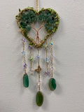 Heart-shaped aventurine chip suncatcher with copper wire tree, dangling green stone pendants and beaded chains