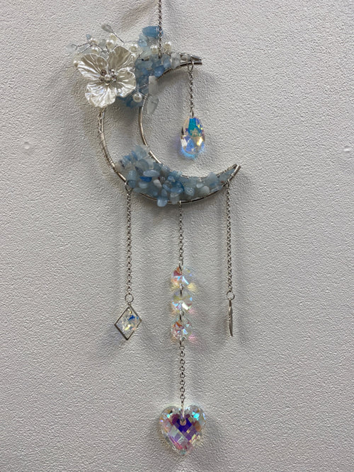 Aquamarine chip crescent moon suncatcher with silver flower detail and cascading crystal pendants