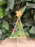 Handmade Christmas tree ornament with gold star top, green wrapped cone body, and coloured felt decorations.