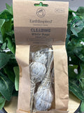 Two bundles of white sage smudge sticks, 4 inches each, tied with twine and displayed in cardboard packaging