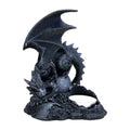 Black metallic dragon figurine perched on rocky base with candle holder cavity