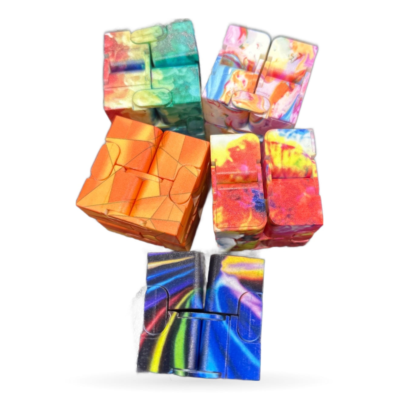 Six colorful infinite fidget cubes with holographic and gradient designs in various colors including rainbow, orange, pink, and blue tones.