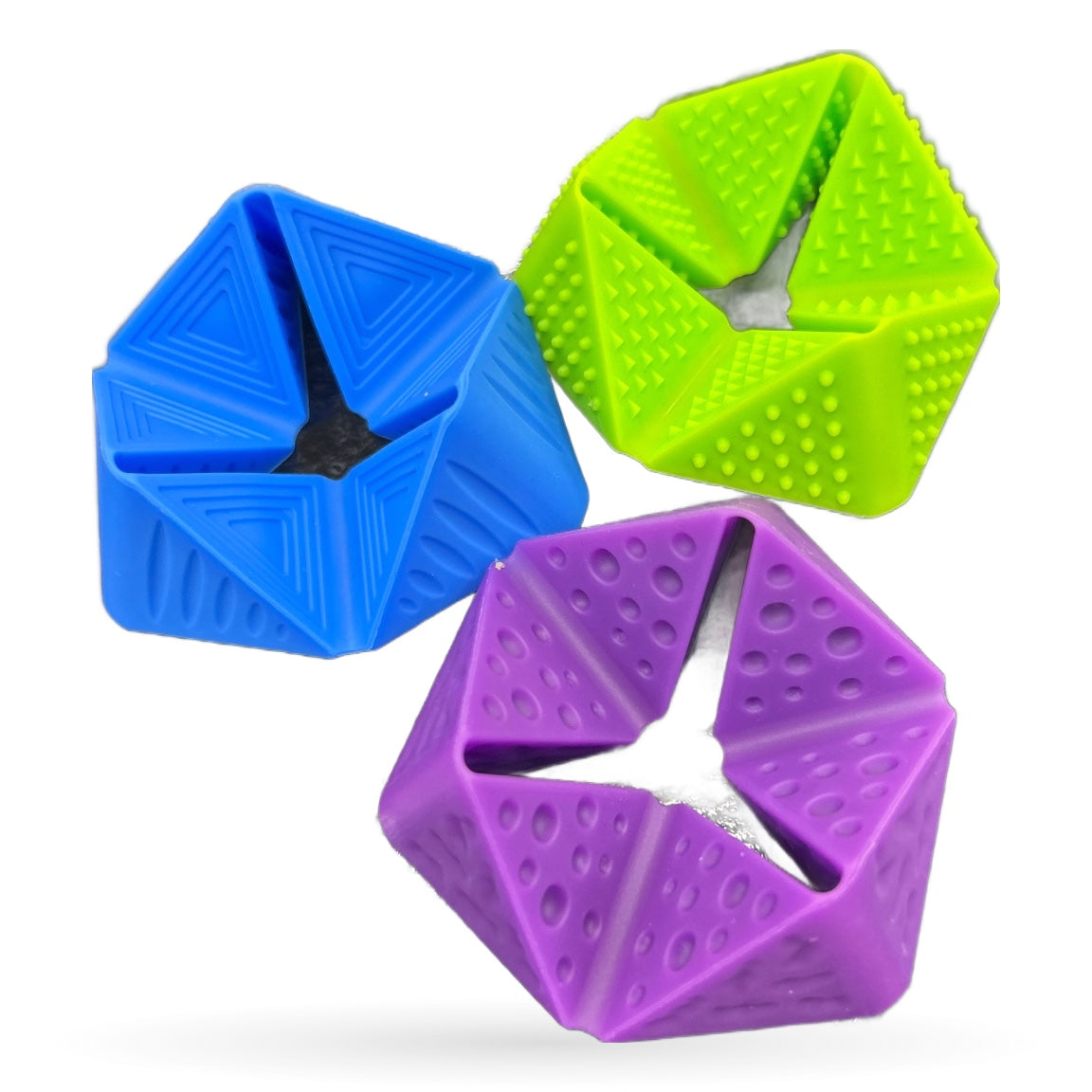 Three colourful silicone flippable cubes in blue, lime green, and purple with textured dot patterns
