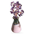 Amethyst crystal money tree with purple stone leaves on copper wire branches in pink ceramic pot