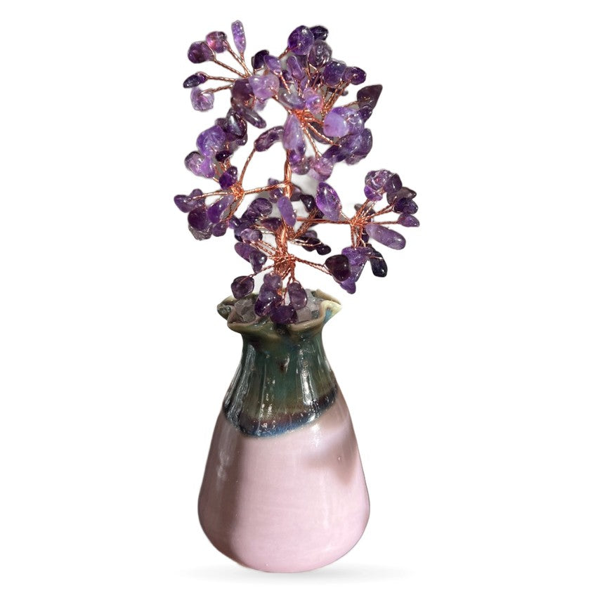 Amethyst crystal money tree with purple stone leaves on copper wire branches in pink ceramic pot