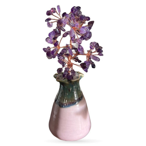 Amethyst crystal money tree with purple stone leaves on copper wire branches in pink ceramic pot
