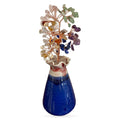 Mixed crystal money tree with copper wire branches, semi-precious stone leaves, and ceramic vase with blue and red glaze