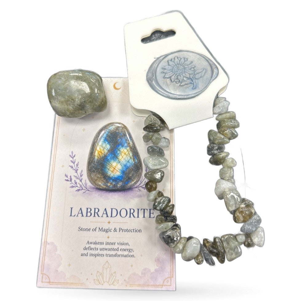 Labradorite tumble stone, chip bracelet, and product card with flower seal displayed together