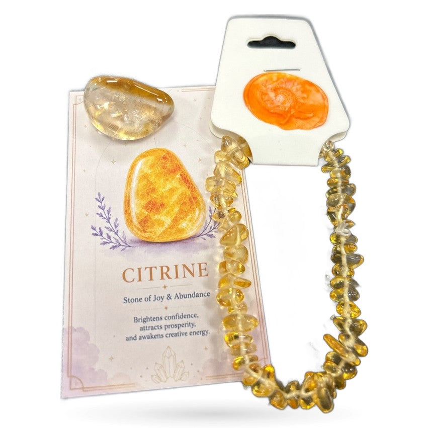 Citrine tumble stone, chip bracelet, and product card with informational tag displayed together