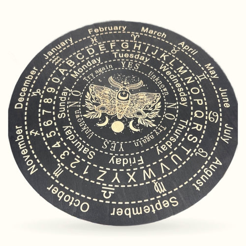Black circular pagan board with zodiac symbols, moon phases, and eagle emblem in center