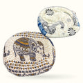 Two handmade coin purses with ethnic elephant and dragon patterns in navy, gold and cream