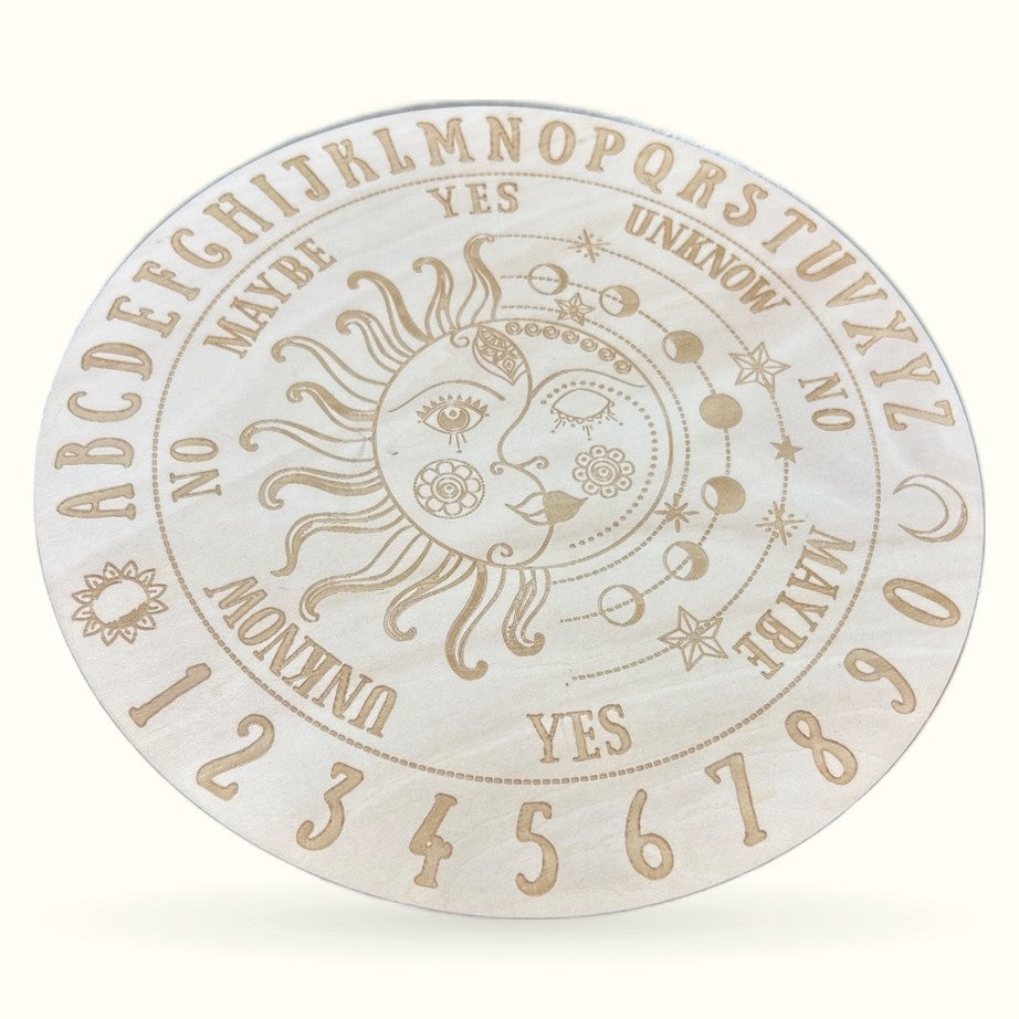 Large circular wooden sun and moon divination board with engraved celestial design and numbered ring