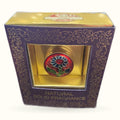 Purple decorative box with ornate gold floral patterns displaying Song of India vanilla solid fragrance with red flower emblem