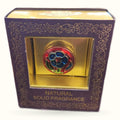 Buddha Delight Natural Solid Fragrance in purple ornate box with golden display window showing red and blue decorative fragrance ball