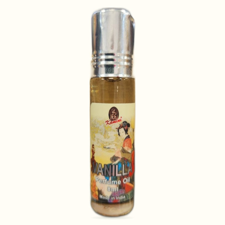 Kamini Vanilla Perfume Oil 8ml bottle with silver spray cap and cream label featuring illustrated woman
