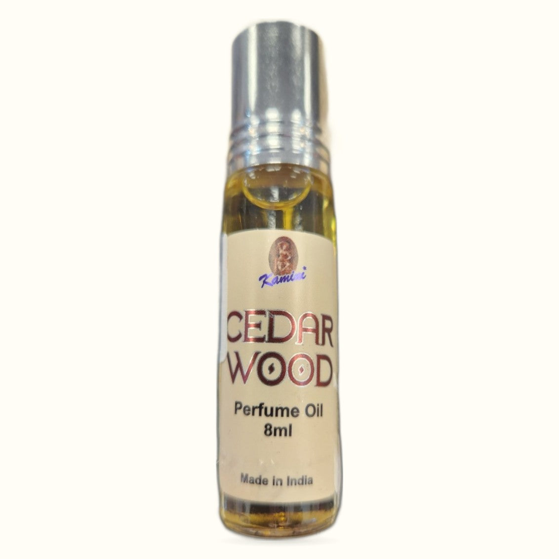 Kamini Cedar Wood Perfume Oil 8ml bottle with silver cap and cream label