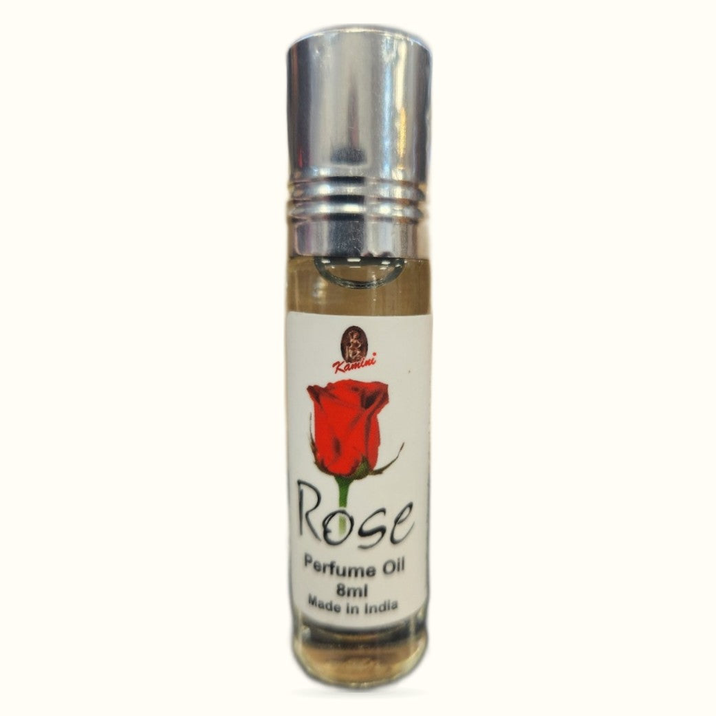 Rose Perfume Oil by Kamini in 8ml roll-on bottle with silver cap and white label