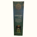 Goloka Manifestations Cleansing Energy reed diffuser in green packaging with gold geometric design and visible product bottle