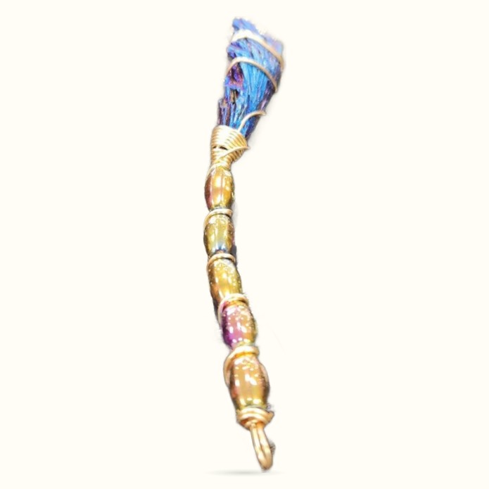 Electroplated black tourmaline broomstick with gold-plated segmented handle and blue crystal top
