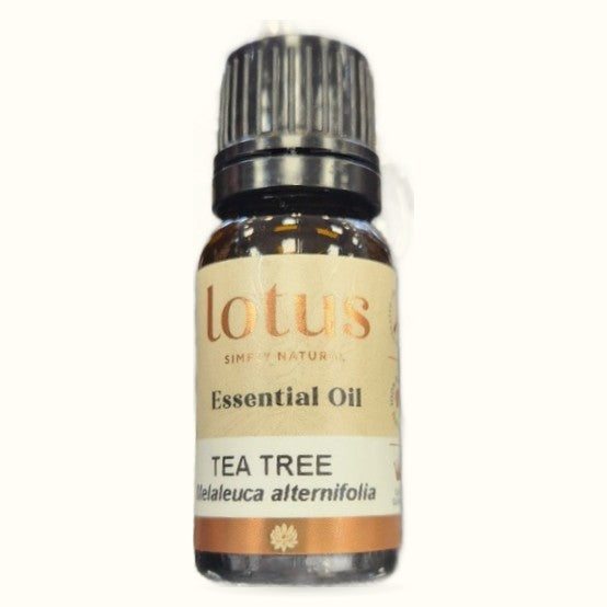 Lotus Essential Oil Tea Tree bottle with dark glass and black cap against white background