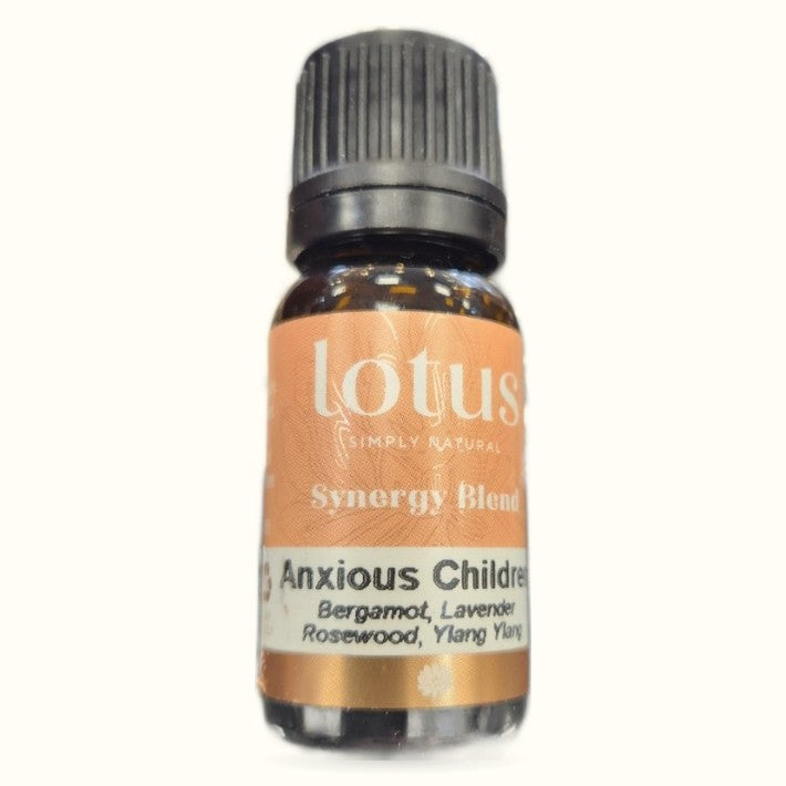 Lotus Synergy Blend Anxious Children essential oil bottle with black cap and peach label