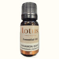 Lotus Cinnamon Bark Essential Oil bottle with grey cap and cream label on white background