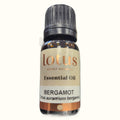 Lotus Bergamot essential oil bottle with amber glass, black cap, and cream label with orange band