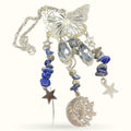 Silver sodalite butterfly hanger with blue beads, crystal drops, stars, and sun-moon charm