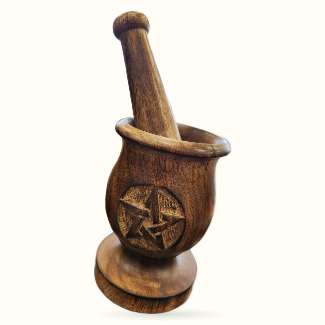 Wooden mortar and pestle with pentagram carving on round base, natural brown finish