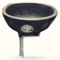 Black cauldron with tree of life emblem and single leg stand