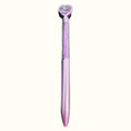 Purple glitter pen with heart-shaped purple top and metallic accents on white background