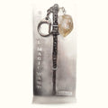 Silver ornate magic wand keychain with raw citrine crystal stone attached