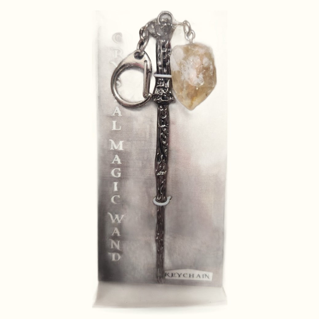 Silver ornate magic wand keychain with raw citrine crystal stone attached