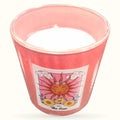 Pink rose quartz chip candle in glass jar with The Sun tarot card label design