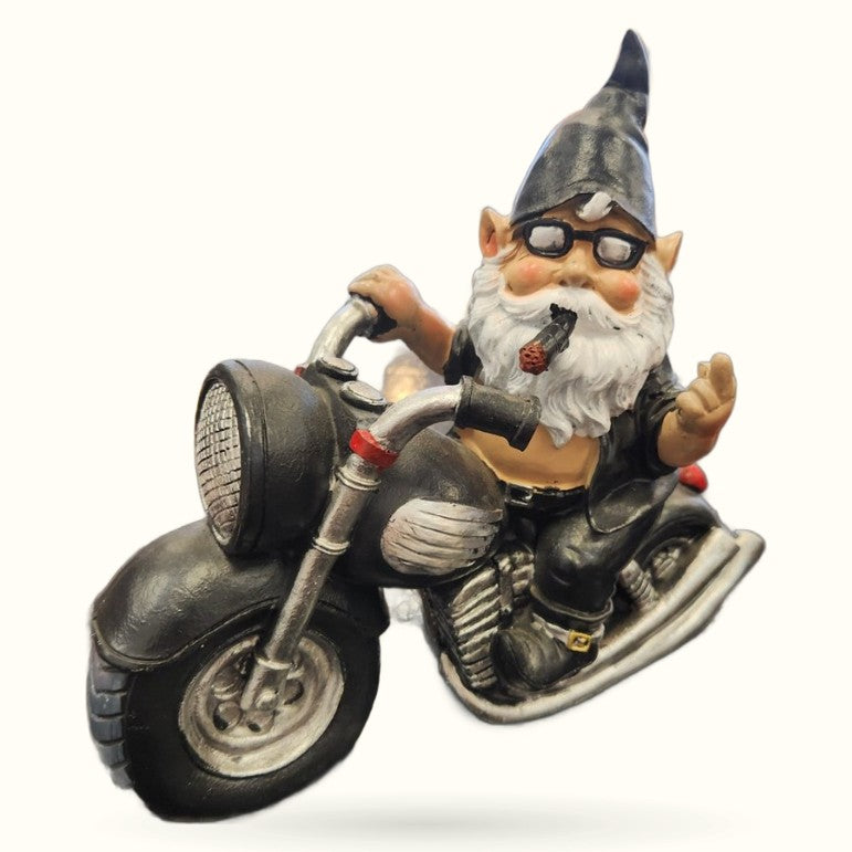 Ceramic biker gnome wearing sunglasses and leather jacket, riding a detailed motorcycle with sidecar