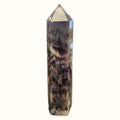 Chevron Amethyst tower with pointed top, deep purple and white banded patterns, polished finish