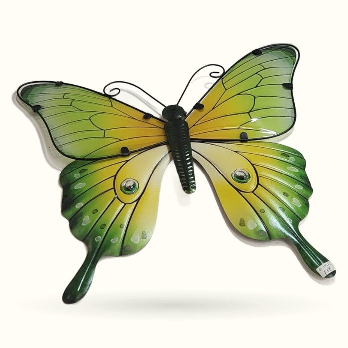 Green and yellow metal butterfly wall art with detailed wing patterns and long tail extensions