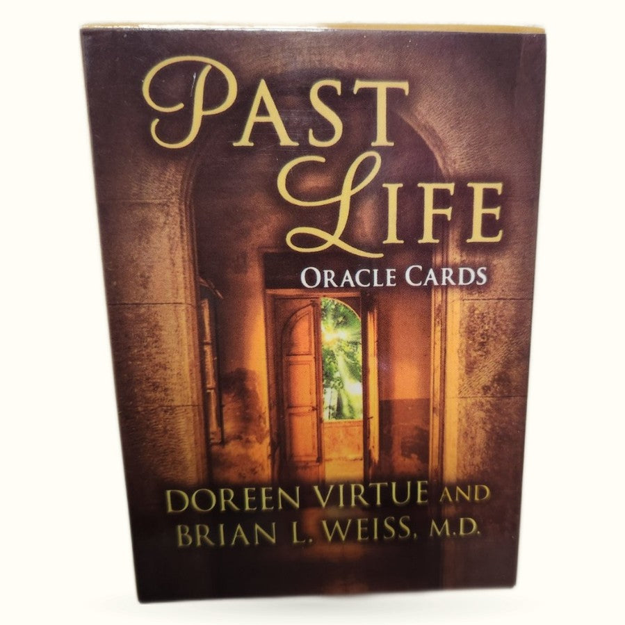 Past Life Oracle Cards deck by Doreen Virtue and Brian L. Weiss with warm brown tones and golden text