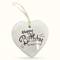 White ceramic heart plaque with 'Happy Birthday To You' text and cream ribbon hanging loop