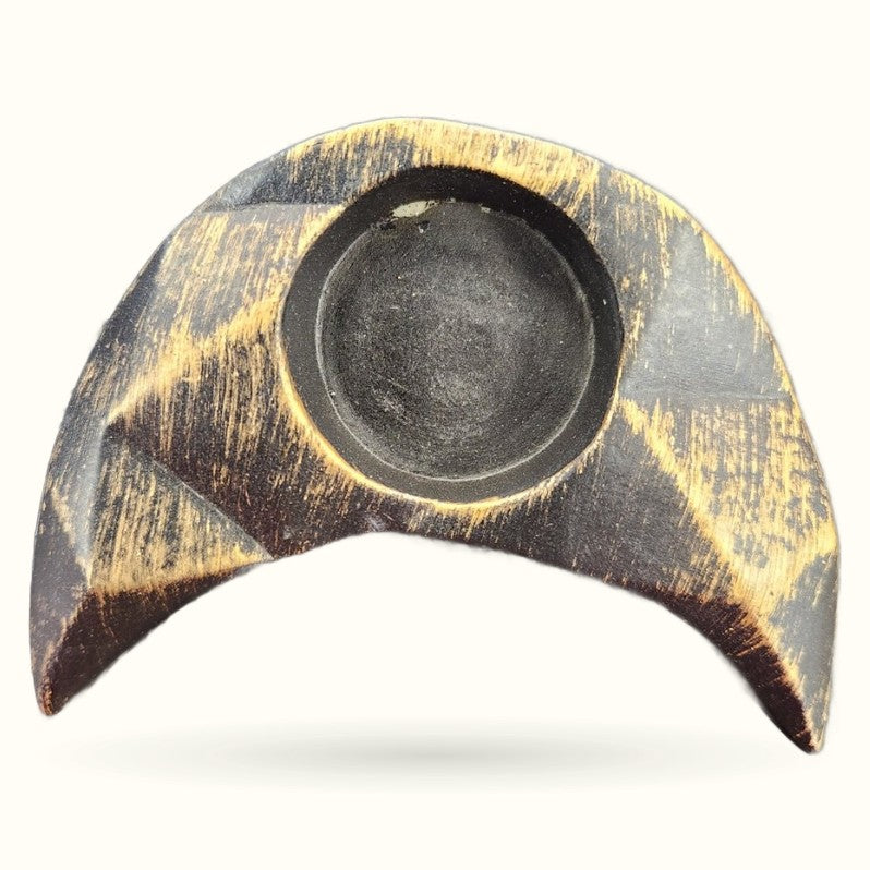 Moon-shaped tealight candle holder with brushed bronze and gold finish, curved crescent design