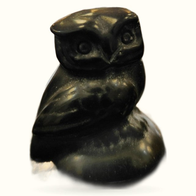 Polished black obsidian owl figurine with carved details, displayed against a white background