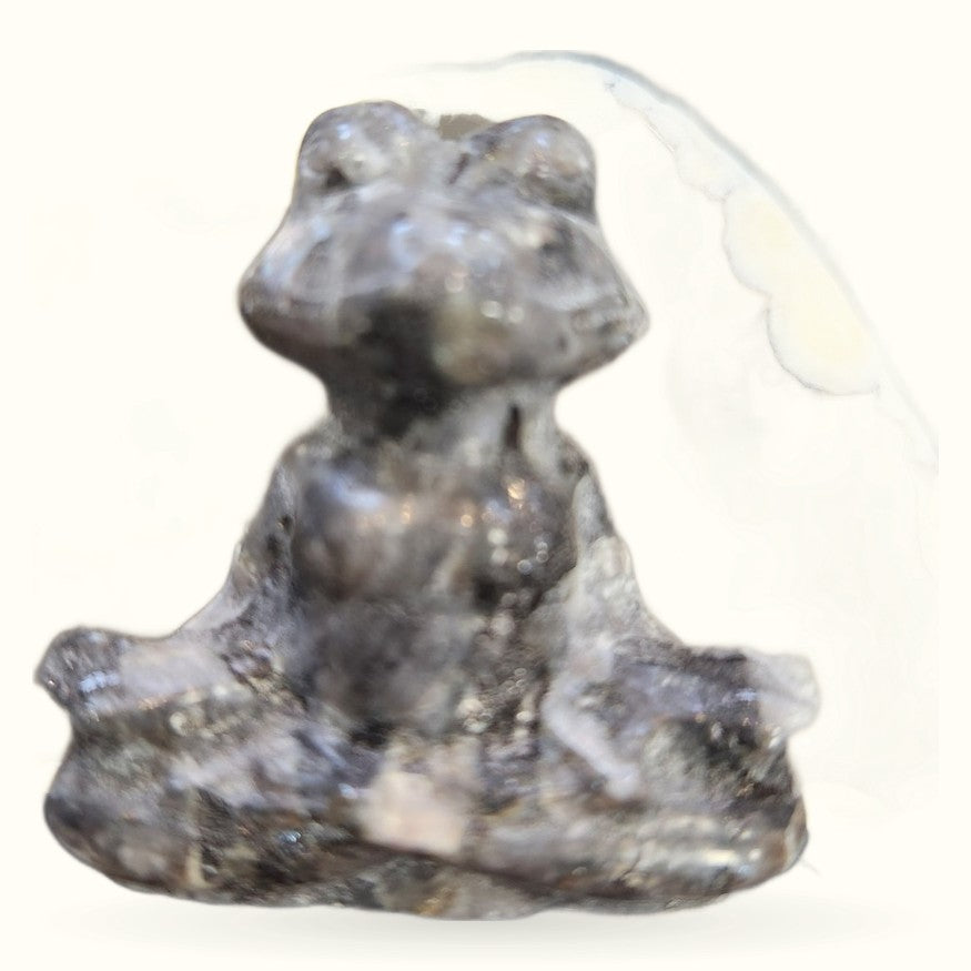 Gray-brown larvikite stone carved into a frog in a yoga pose sitting position