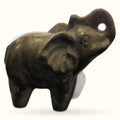 Dark bronze pyrite elephant figurine with raised trunk, small hole detail, viewed from side angle